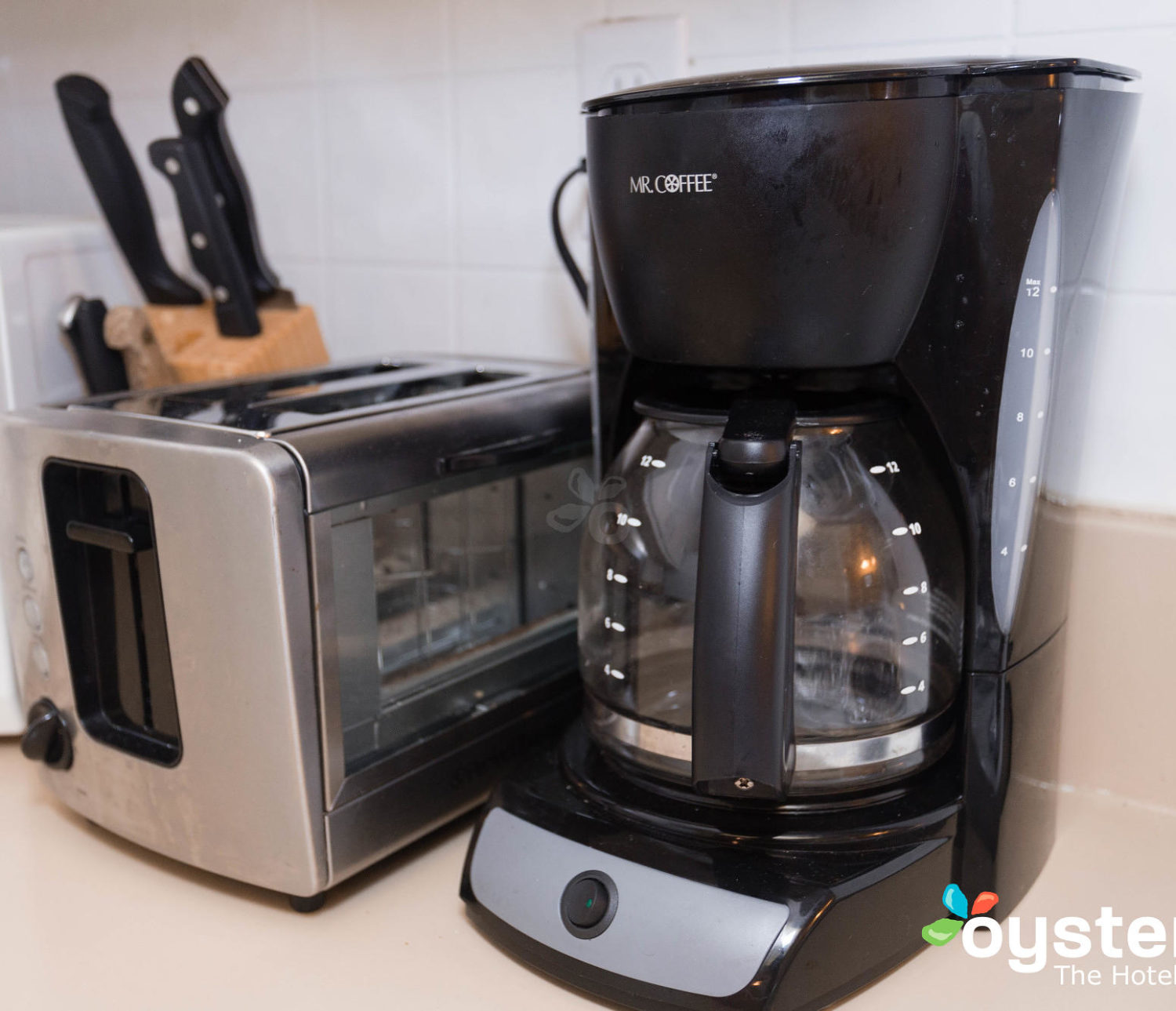 Hideaway Hotel - coffee maker, toaster and utensils in kitchenette