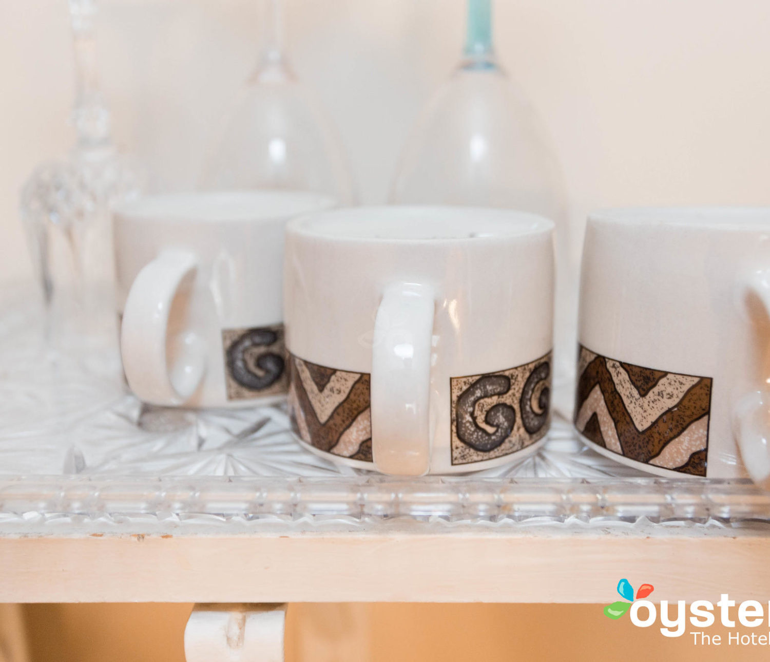 Hideaway Hotel - kitchen cupboard with drinkware