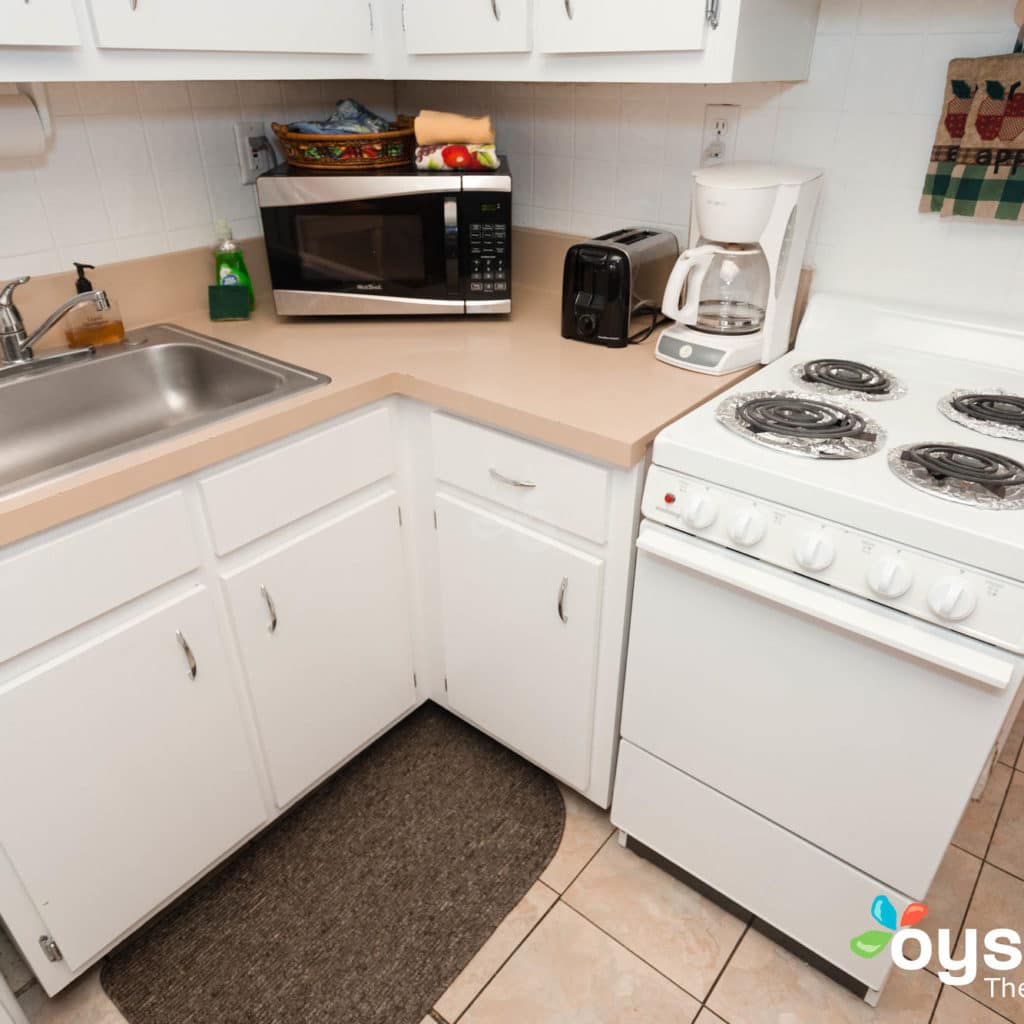 Hideaway Hotel - kitchenette with microwave, toaster, coffee maker and stove