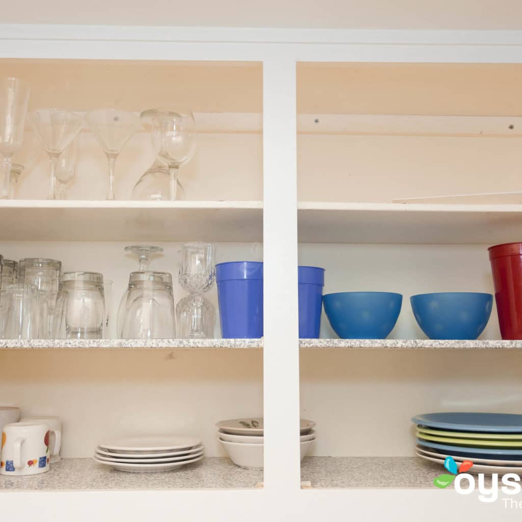 Hideaway Hotel - dishes in cupboard